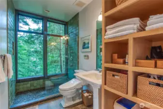 The ensuite bath has a spectacular shower where you feel like you are almost "forest bathing".
