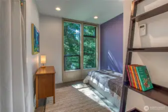 The third bedroom is cozy.
