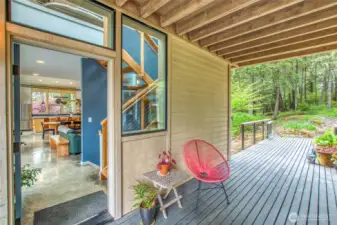 The bridge leads to the center of the home. This door is to the great room.