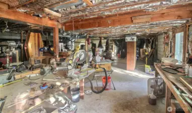 Front Left of the 1590 sq ft basement with full of possibilities. 40' Steel beam can be laid out to make one large room with enough ceiling height