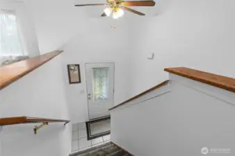 Entry way looking down to the landing.