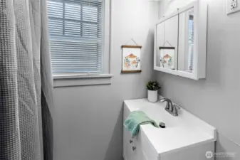 One updated bathroom in the lower unit