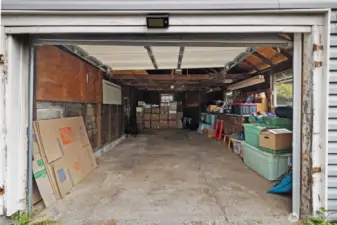 Generously sized garage. Ready for your workshop, storage, or parking your vehicle.