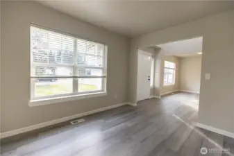 View of the living room looking toward the front entry