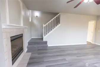 Family room looking at stairway to upper level