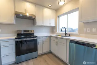 Kitchen with all new cabinets and quartz counters