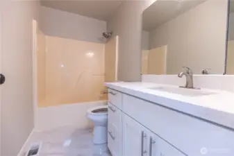 Min upstairs bath with fiberglass tub/shower combo