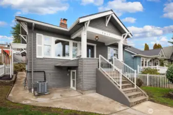 1918 Craftsman sited above the street, private and fully fenced.
