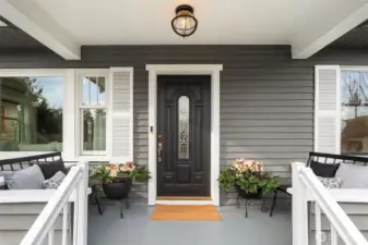 Classic "rocking chair" covered front porch ~ perfect for that morning cup of coffee!