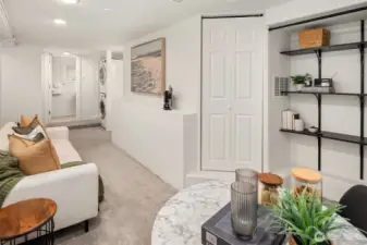 Another view of the bonus space. Door to the left of shelving hides furnace and hot water tank.