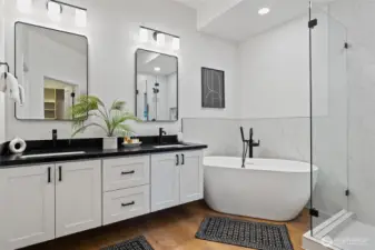 Double cantilevered sinks, soaking tub, and large shower