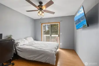 Bedroom 2 upstairs with private deck.