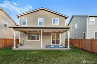 Covered porch extends the full of the patio.