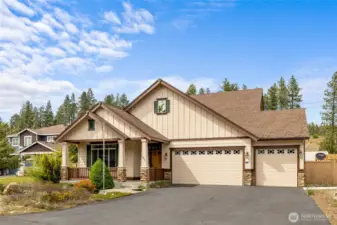 3 car garage and paved driveway provides plenty of parking.