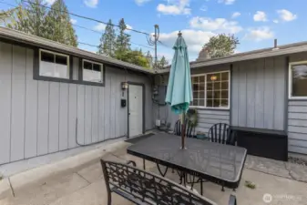 front patio leading to 2 family entrances