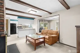Family Room with bonus room off kitchen w/fireplace