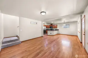 Large and open main living area and stair to second level bedrooms and bathrooms