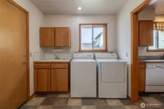 Laundry with newer washer and dryer
