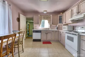 Spacious kitchen with eating area.
