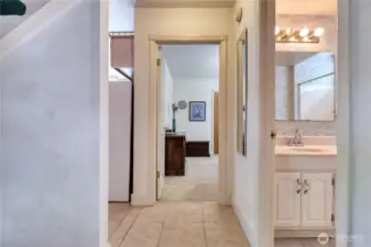 Hallway to downstairs primary bedroom.