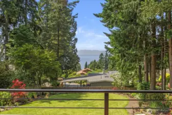 Revel in west-facing Puget Sound views that captivate from all three levels of the home.