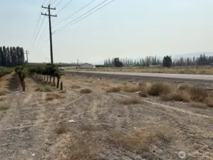 Frontage of the property off the 243 looking to north.