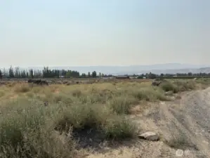 This is the S.E corner of the lot. See the gravel road the runs along the south side of the property.