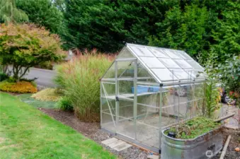 Green house stays with property