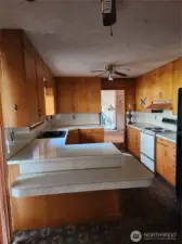 Kitchen with eat in space, pantry and so much storage! All appliances stay.