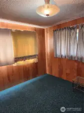 Bedroom 2. Large windows allow for plenty of natural light, room to be emptied prior to closing