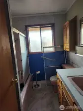 Full Bath has a more built in storage behind door