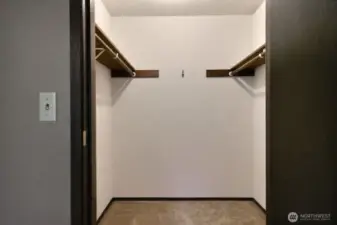 Primary walk-in closet.