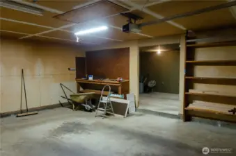 There is a 3-car garage.  The double garage is original, the 3rd bay and storage room was added.  Such great space!