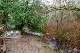 Take a stroll down the path from the backyard to the seating area overlooking the creek.  What an amazing space to enjoy the sounds and sights of nature.