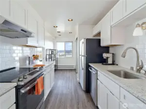 Updated Kitchen with Quartz Counters & SS Appliances