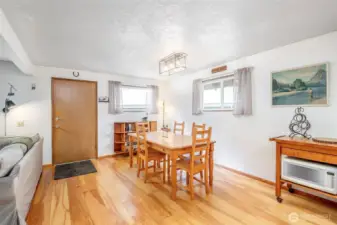 Multiple windows provide natural light, wooded views, and nature-connected ambiance. Bonus- they're also energy-efficient, and vinyl double-pane!