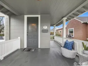 Notice the beautiful, original front door and the architectural detail of this classic home.