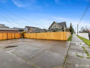 This is the large parking space off of the alley, big enough for your vehicles and RV. A gate leads to the backyard.