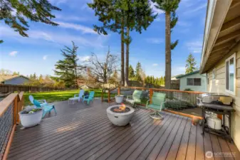 Deck located off the main living area, plenty of room entertaining BBQ's and lines up with large flat back yard
