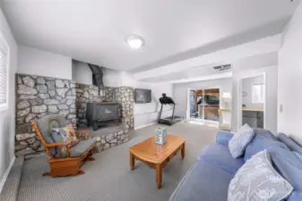 Private access through slider to exterior covered storage area under deck and to back yard oasis