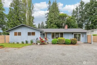 Front of home facing the 20th St Road. The home is fully fenced and gated.   Very close to Tressel and all amenities, shopping and Costco...easy on-to Route 9 N&S and/or I-5 N&S  Home is Zoned Lake Stevens Commercial District. I have 2 lots sie by side 8329 & 8405, I fenced her home as well.