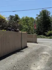 Looking from garage area down drivway....when looking to visit or view the home ...there is a ingress and egress making parking easy to enter and easy to exit . This property holds many cars for bar-bq moments and company or family parties etc..