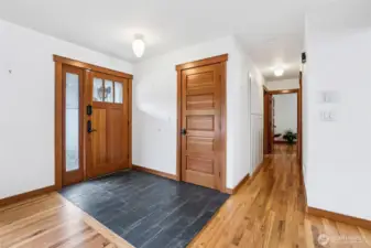 Beautiful entrance with stunning hardwood floors. Hallway leads you to the primary bedroom with additional space to make an office or close off for bedroom. Second bedroom across from conjoined ha bathroom