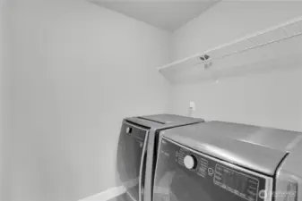 Upstairs laundry room. Washer and dryer are included.