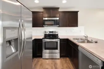 Stainless Steel appliances in the kitchen.