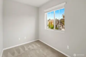 Bonus room upstairs for hobbies or home office with a window that faces the street.