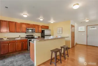 Kitchen with beautiful quartz counters.