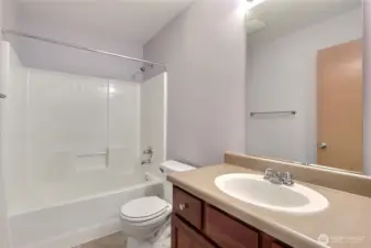 Upstairs full hall bath.