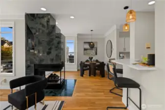 Gas fireplace anchors the space.