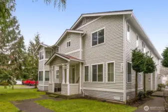 Building backs private greenbelt & trails